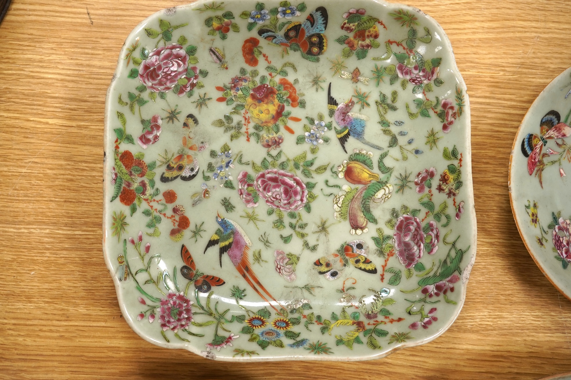Four 19th century Chinese famille rose celadon ground dishes, largest 25cm